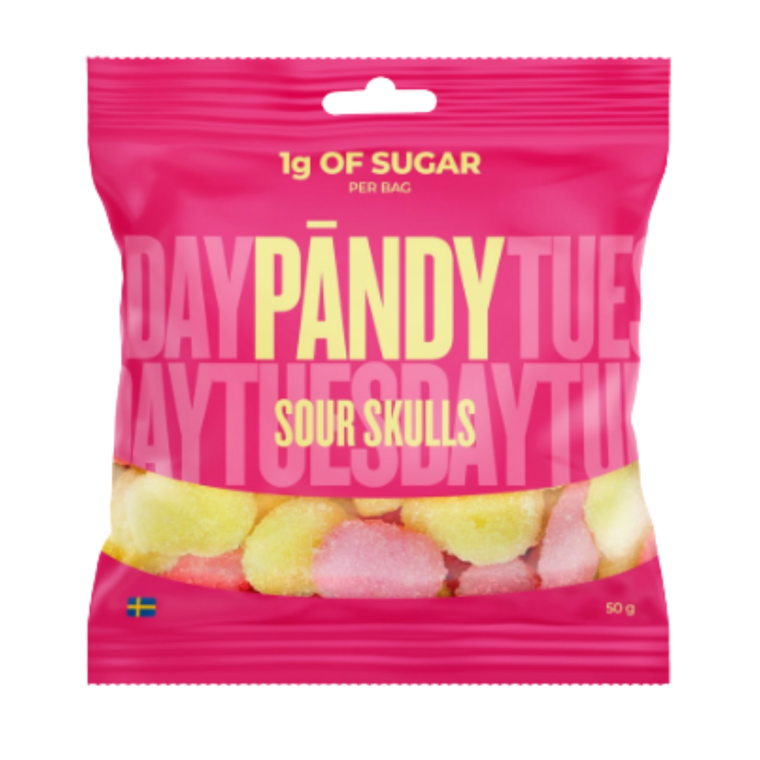A 50g bag of Pandy Sour Skulls candy, featuring a bright pink packaging with yellow and white lettering and a clear window showing the colorful skull-shaped candies inside.
