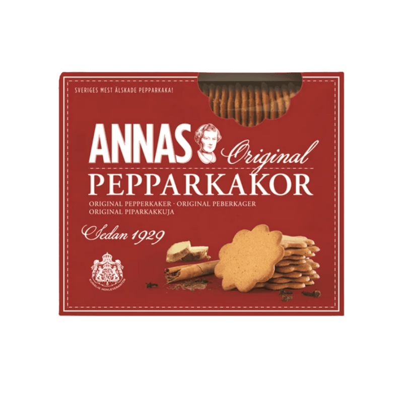 Packaging of Anna's Original Ginger Cookies with the product visible through a cut-out window, against a red background with white text and Christmas-themed graphics.