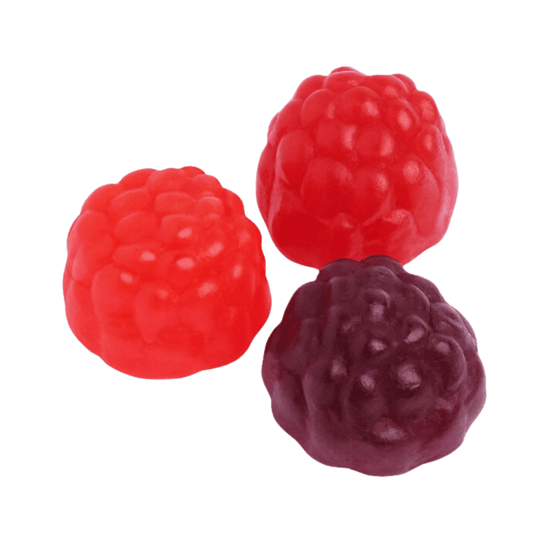 Three pieces of candy, two red and one blue, shaped like wild berries, set against a transparent background.