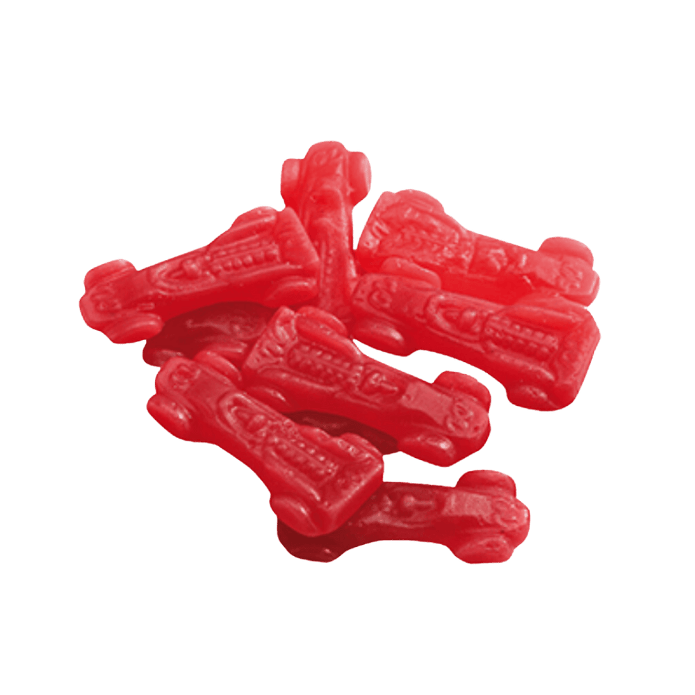 A pile of red, caramel-colored gummy candies shaped like the iconic Ferrari car.