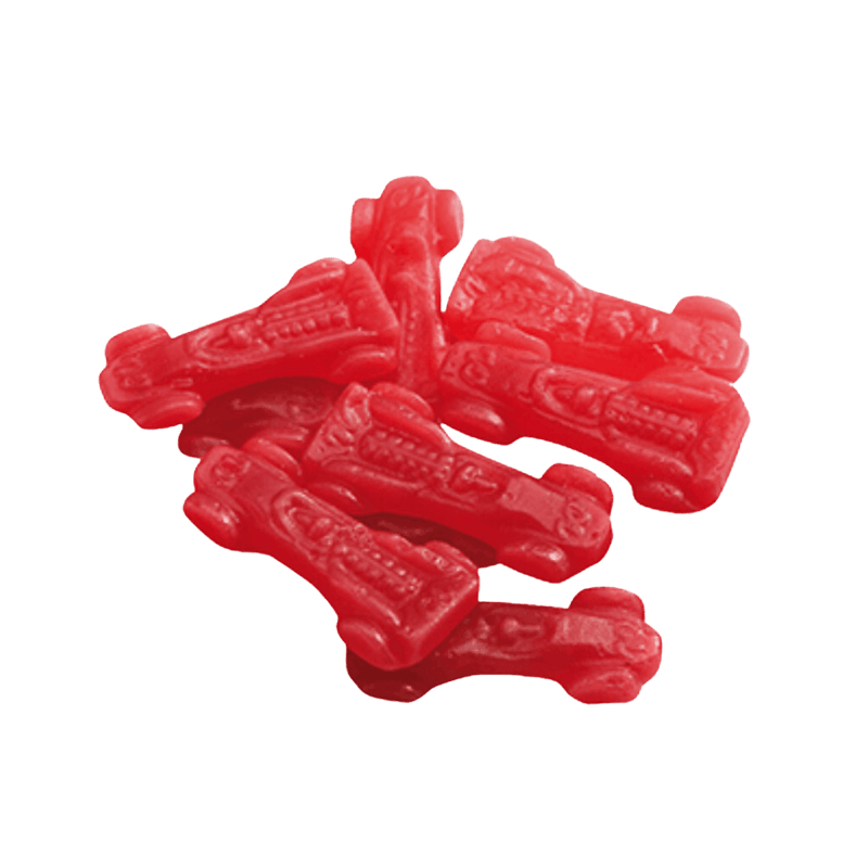 A pile of red, caramel-colored gummy candies shaped like the iconic Ferrari car.