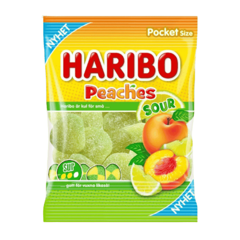 A package of Haribo Peaches Sour pocket-size gummy candies, featuring a bright yellow and green bag with illustrations of peaches, limes, and green sour gummies.
