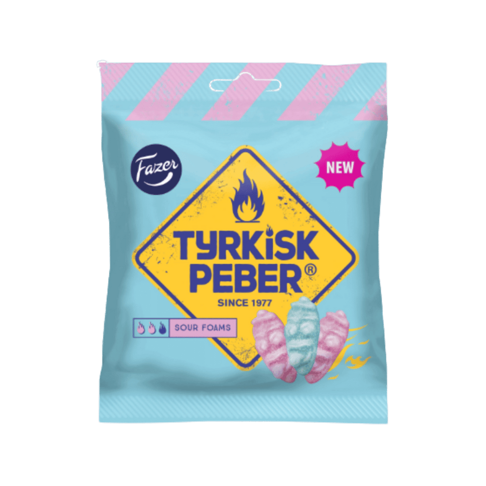 A package of Fazer Tyrkisk Peber Sour Foams candy in a light blue bag with pink diagonal stripes at the top, a large yellow diamond logo, and illustrations of pink and blue foams.