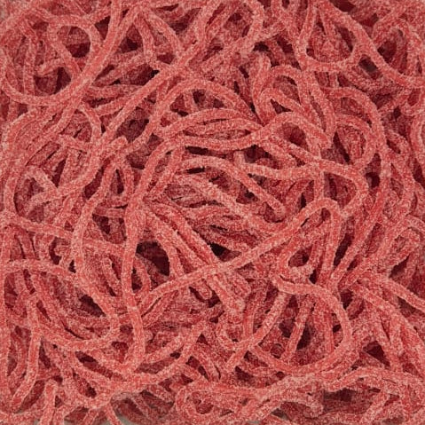 A clear plastic square container filled with pink curly string or cord, photographed from above on a white surface.
