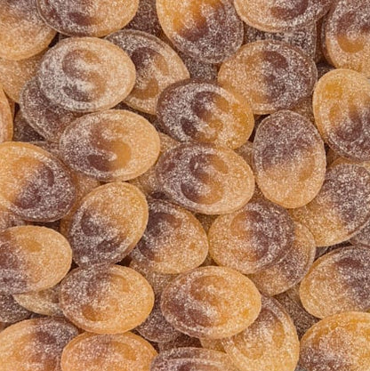 Container of dried apricots on a plain background