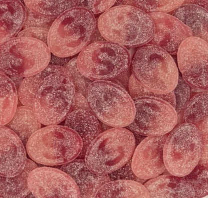 Clear plastic container filled with pink and red round candies on a light gray background