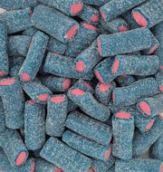 A clear plastic tub filled with blue sugar-dusted cylindrical candies with pink centers, photographed from above on a white surface.