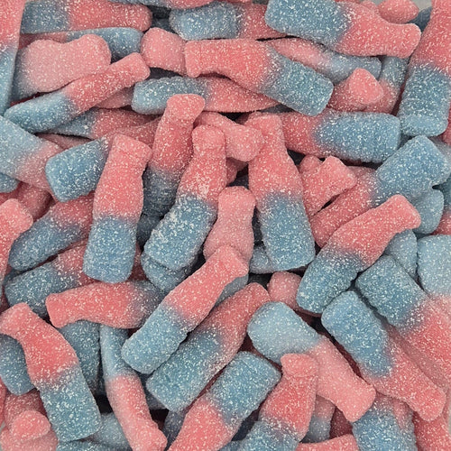 A close-up pile of soft gummy candies shaped like soda bottles, coated with a pink and blue gradient sugar dusting.