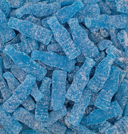A close-up pile of blue, sugar-coated gummy candies shaped like miniature soda bottles.